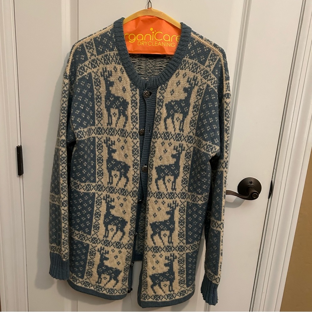 Norwegian deer sweater in blue and white.